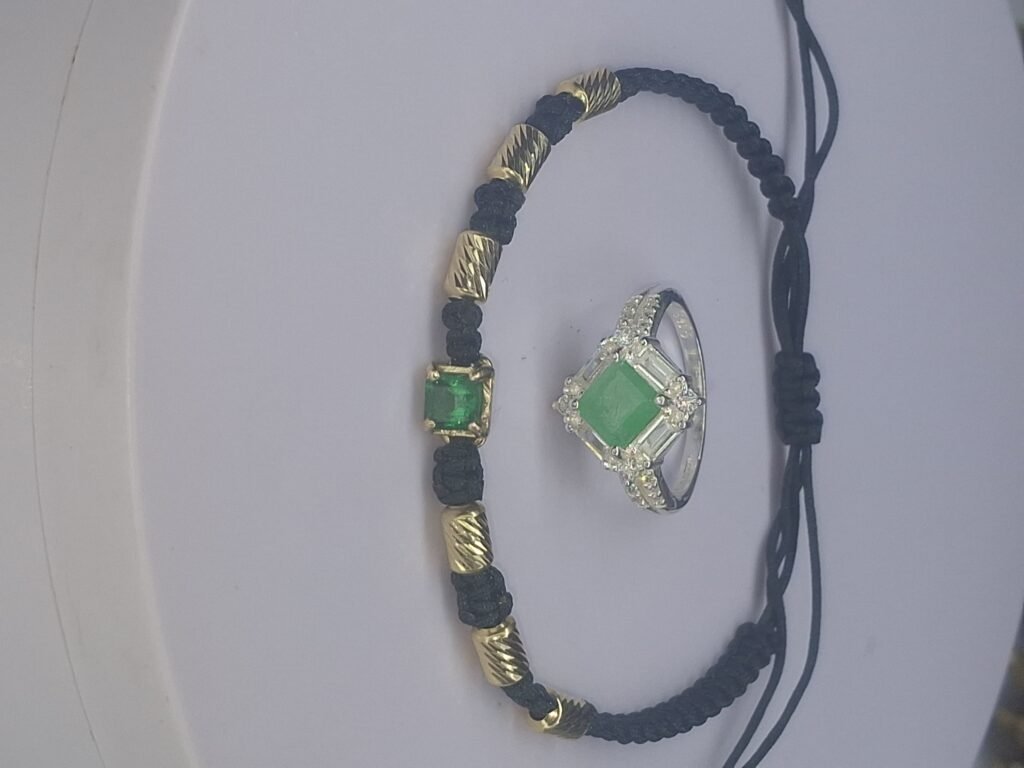 Manilla tejida con barriles de oro 18k y hermosa esmeralda colombiana